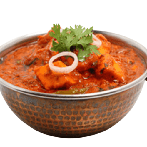 Spicy and flavorful fish curry cooked with a robust blend of Kolhapuri spices and coconut